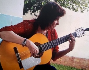 Jo Playing Guitar Outside